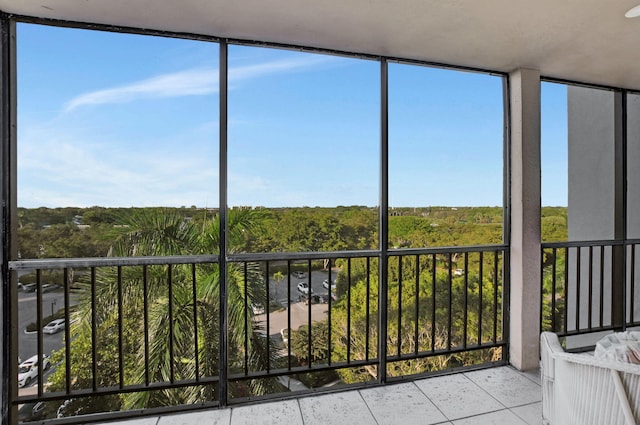 unfurnished sunroom featuring a wealth of natural light