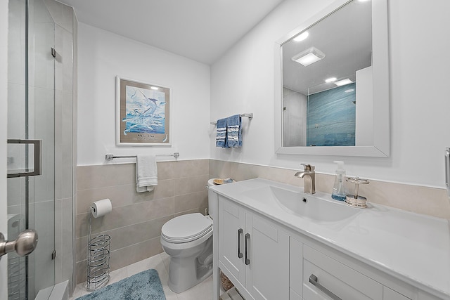 full bathroom featuring a shower with shower door, toilet, tile walls, and tile patterned flooring