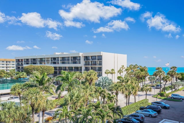 view of building exterior featuring a water view