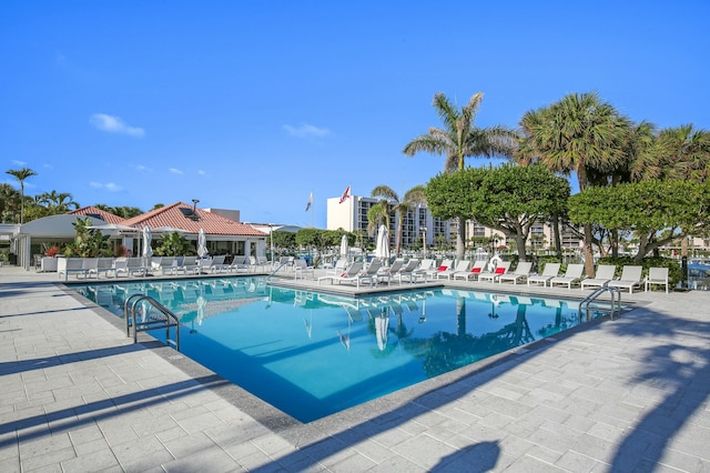 view of swimming pool with a patio