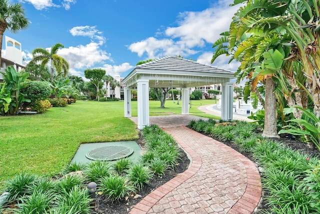 view of community featuring a gazebo and a lawn