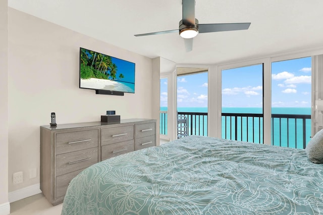 bedroom featuring access to exterior and ceiling fan