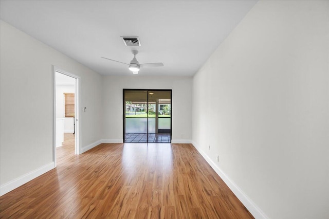 1714 Palmland Dr Unit 1714, Boynton Beach, FL 33436 - unfurnished room with ceiling fan, light wood-type flooring, and baseboards