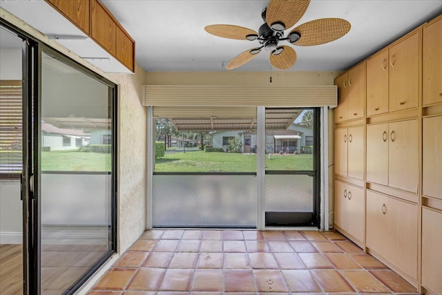 1714 Palmland Dr Unit 1714, Boynton Beach, FL 33436 - unfurnished sunroom featuring a ceiling fan
