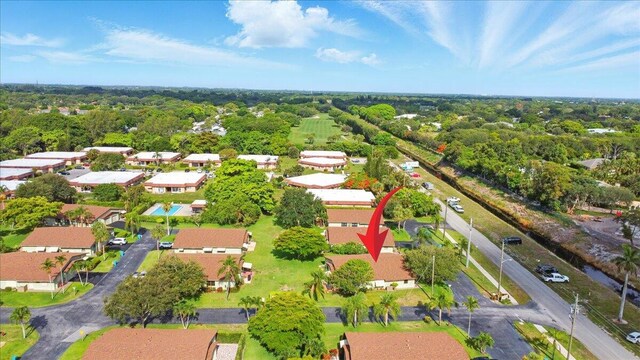 1714 Palmland Dr Unit 1714, Boynton Beach, FL 33436 - aerial view of property and surrounding area featuring nearby suburban area