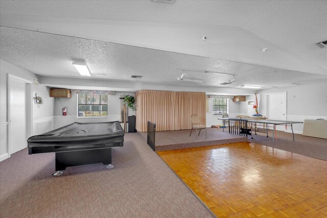 1714 Palmland Dr Unit 1714, Boynton Beach, FL 33436 - playroom featuring a textured ceiling, a wainscoted wall, and pool table
