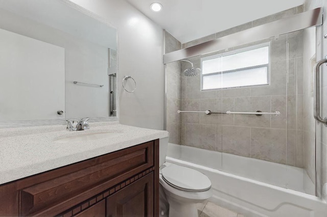 full bathroom featuring vanity and toilet