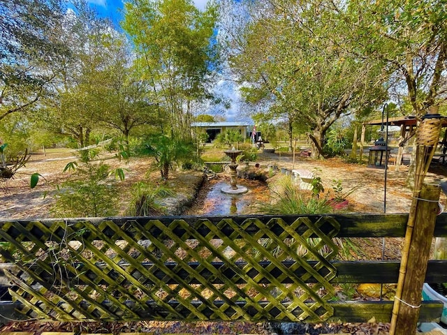 16738 NW 262nd St, Okeechobee, FL 34972 - view of community featuring fence