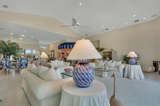 living area featuring recessed lighting, visible vents, vaulted ceiling, and light tile patterned flooring