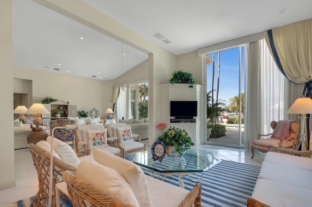 living room featuring recessed lighting and light tile patterned floors