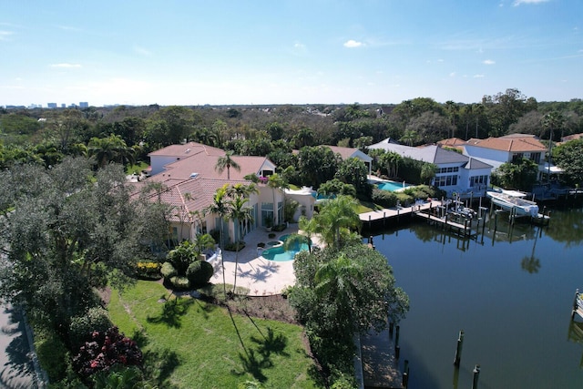 bird's eye view featuring a residential view and a water view