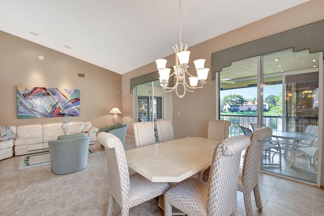 tiled dining area with a chandelier, visible vents, and vaulted ceiling