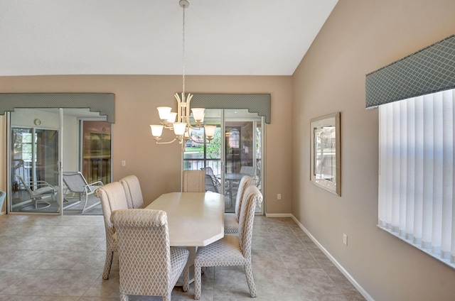 dining area with light tile patterned floors, baseboards, lofted ceiling, and a chandelier