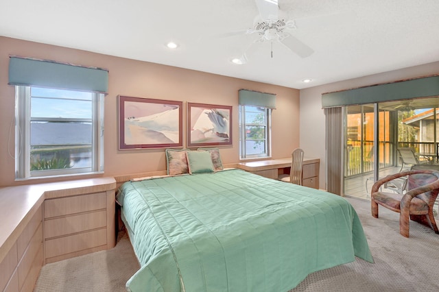 bedroom featuring access to exterior, recessed lighting, light carpet, and a ceiling fan