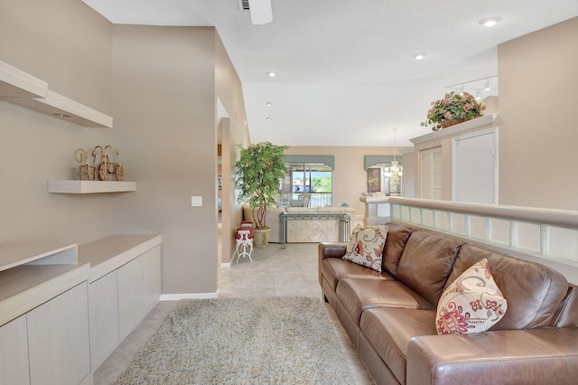 living room featuring light tile patterned floors and baseboards