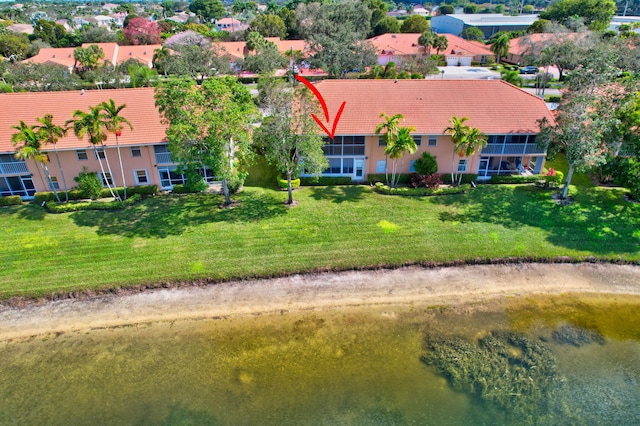 bird's eye view with a water view