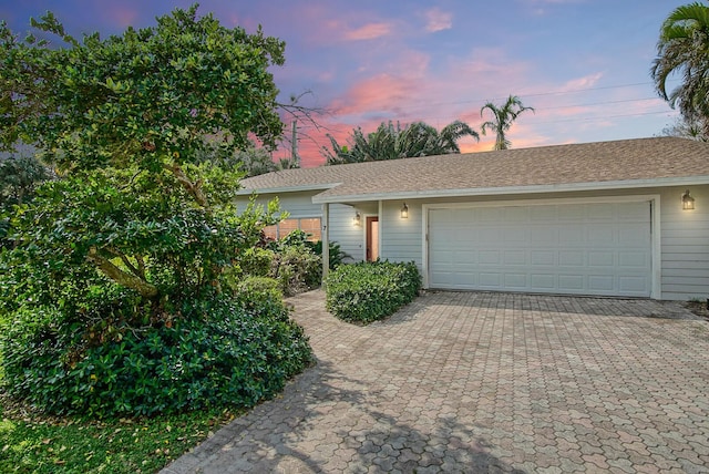 view of front of property featuring a garage