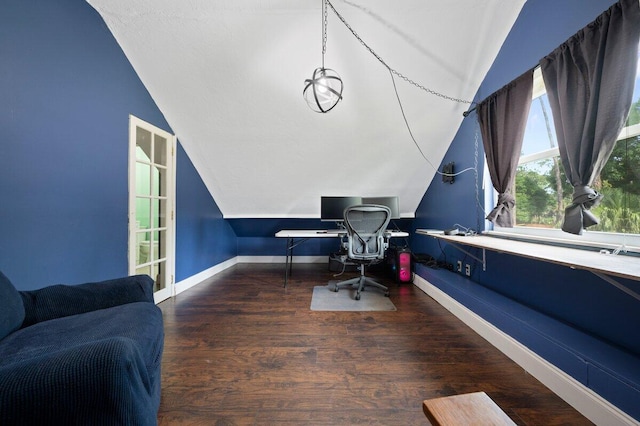 office space featuring lofted ceiling and dark hardwood / wood-style flooring