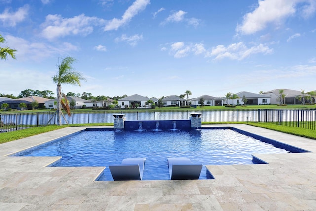 view of swimming pool with a water view and a patio area