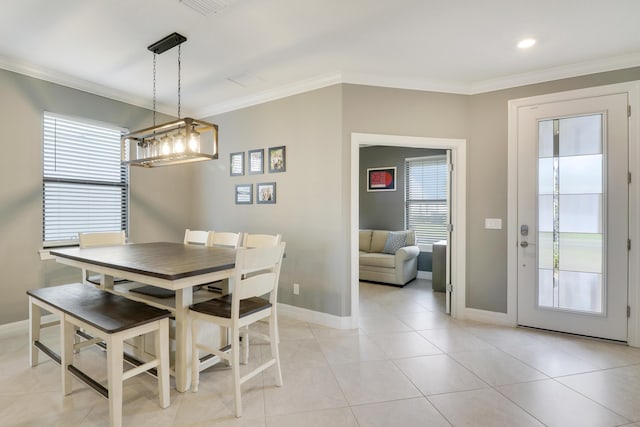tiled dining area with crown molding