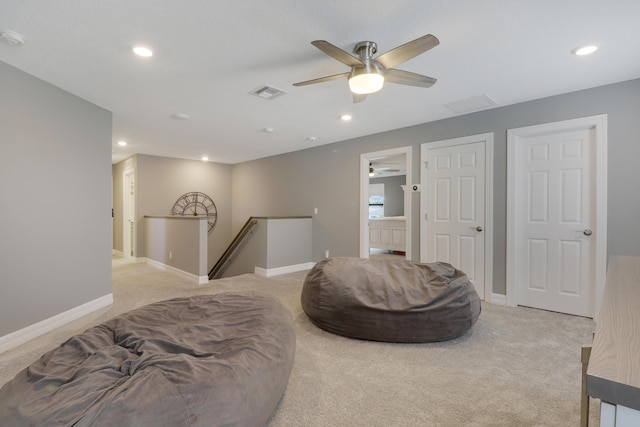 sitting room with light colored carpet