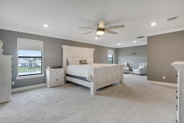 bedroom with light carpet, crown molding, and ceiling fan