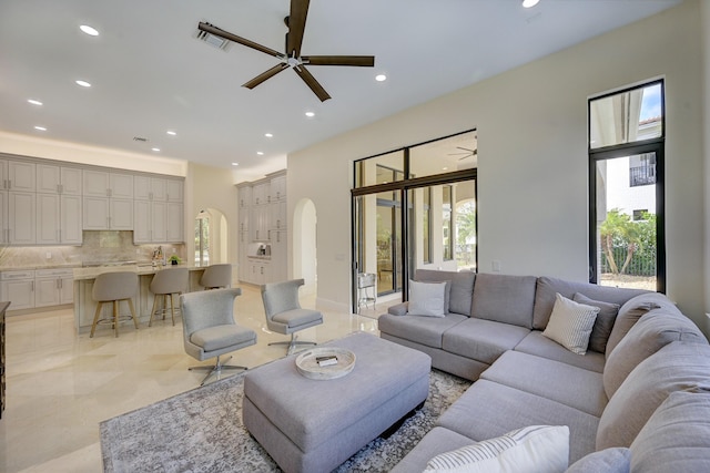 living room with ceiling fan