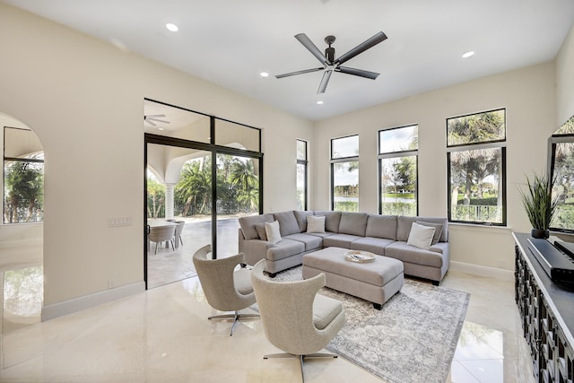 living room with ceiling fan