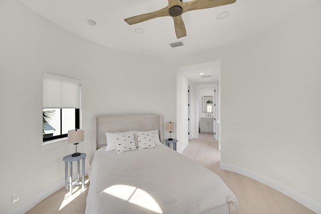 bedroom featuring ceiling fan and light wood-type flooring