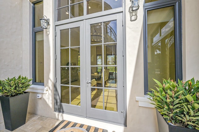 entrance to property featuring french doors