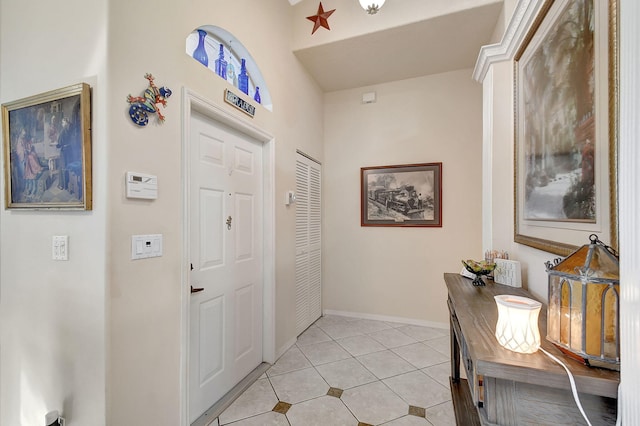 entrance foyer featuring light tile patterned floors