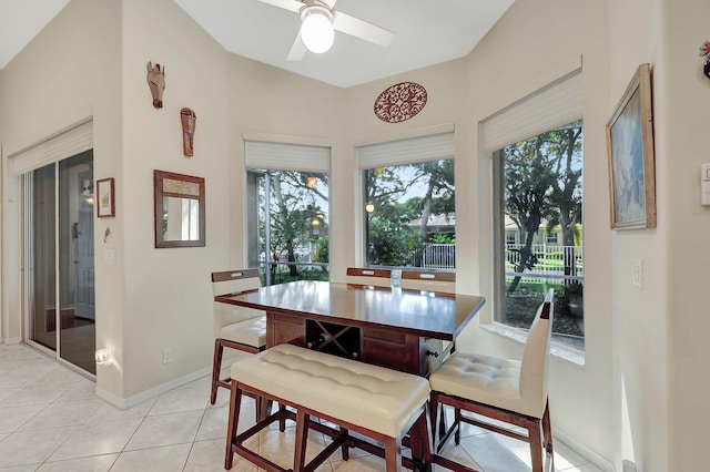 dining area featuring light tile patterned floors and ceiling fan