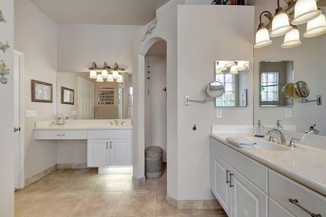 bathroom with tile patterned flooring and vanity