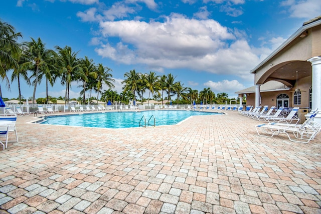 view of swimming pool with a patio area