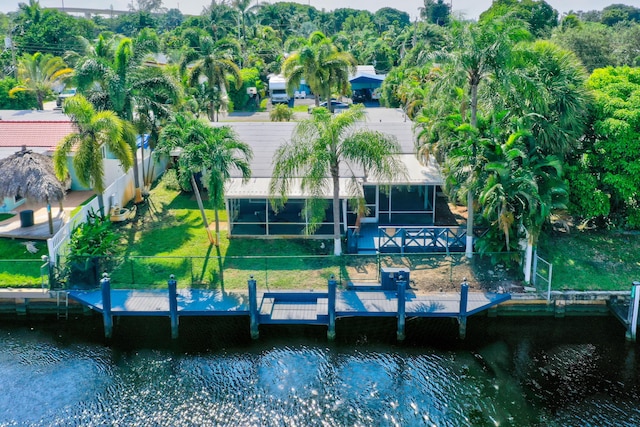 birds eye view of property featuring a water view