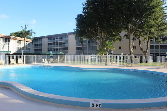 community pool with fence