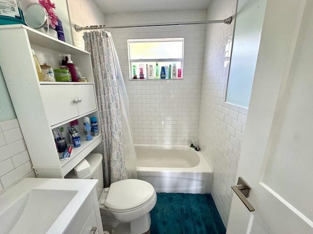 full bathroom with shower / bath combination with curtain, toilet, and sink