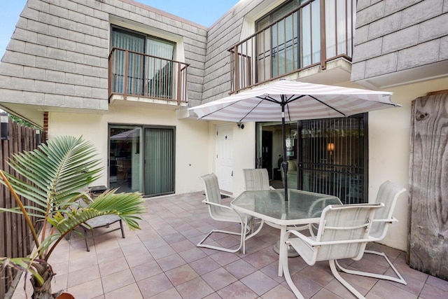 view of patio / terrace with a balcony