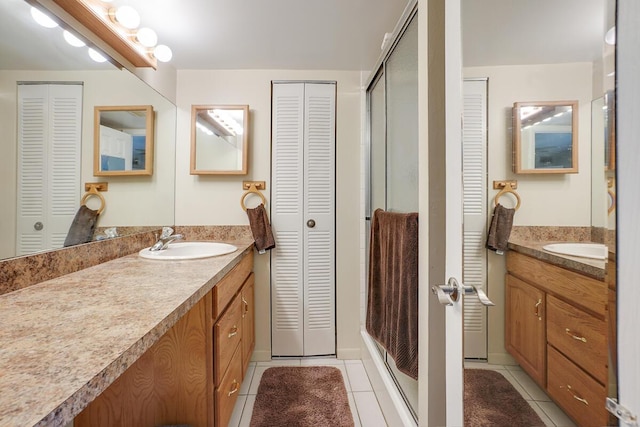 bathroom featuring tile patterned floors and vanity