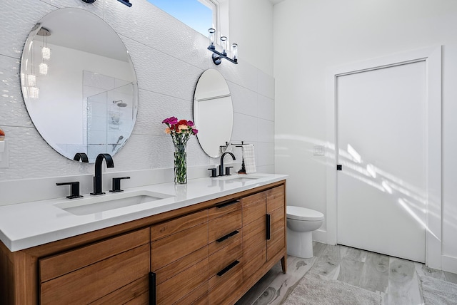 330 Franklin Rd, West Palm Beach, FL 33405 - bathroom featuring double vanity, wood finished floors, toilet, and a shower with door