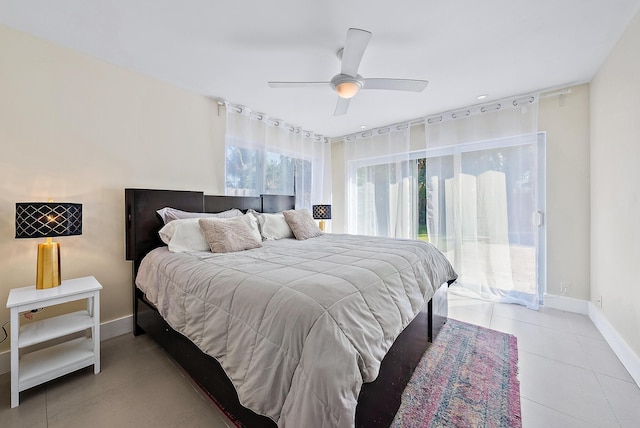 330 Franklin Rd, West Palm Beach, FL 33405 - bedroom featuring baseboards, tile patterned floors, and a ceiling fan