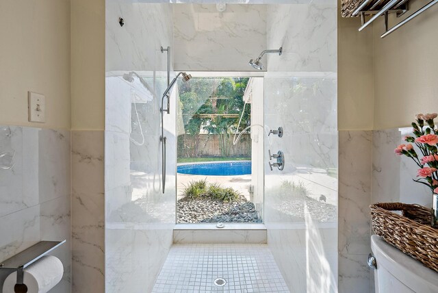 330 Franklin Rd, West Palm Beach, FL 33405 - bathroom with toilet, tile walls, and a shower