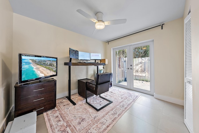330 Franklin Rd, West Palm Beach, FL 33405 - sitting room with french doors, ceiling fan, baseboards, and tile patterned floors