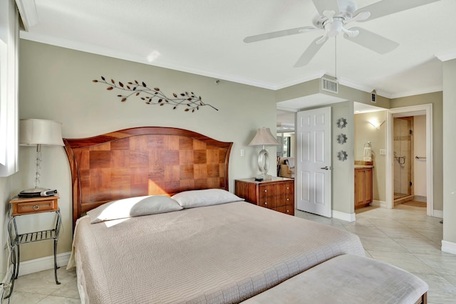 tiled bedroom featuring ceiling fan, ornamental molding, and ensuite bathroom