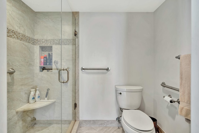 bathroom with toilet and walk in shower