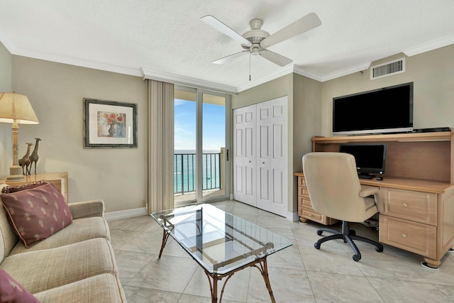 home office with a textured ceiling, ornamental molding, and ceiling fan