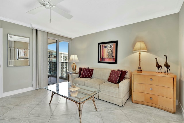 living room with ceiling fan and ornamental molding