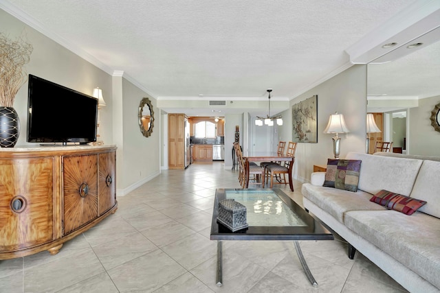 living room with crown molding, an inviting chandelier, a textured ceiling, and light tile patterned floors