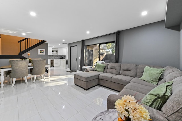 living room with light tile patterned flooring