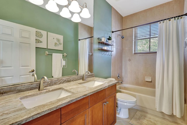 full bath with shower / tub combo, a sink, toilet, and tile patterned floors